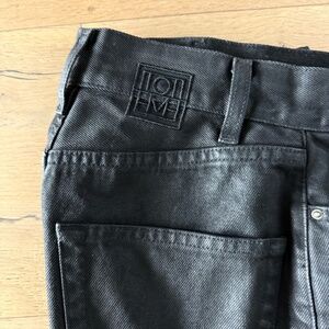 TOTEME Cropped waxed high-rise tapered pants | 23